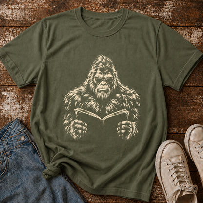 Big Foot Reading Book Softstyle T-Shirt | Book Lover Gift Military Green