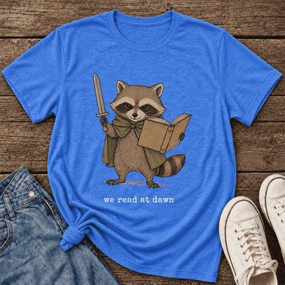 We Read At Dawn Funny Racoon Ultra-Soft Cotton T-Shirt | Playful Reader Gift Heather True Royal