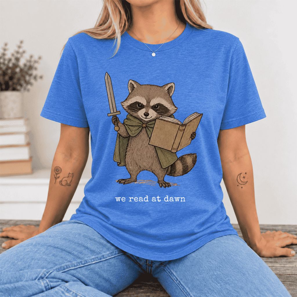 We Read At Dawn Funny Racoon Ultra-Soft Cotton T-Shirt | Playful Reader Gift Heather True Royal