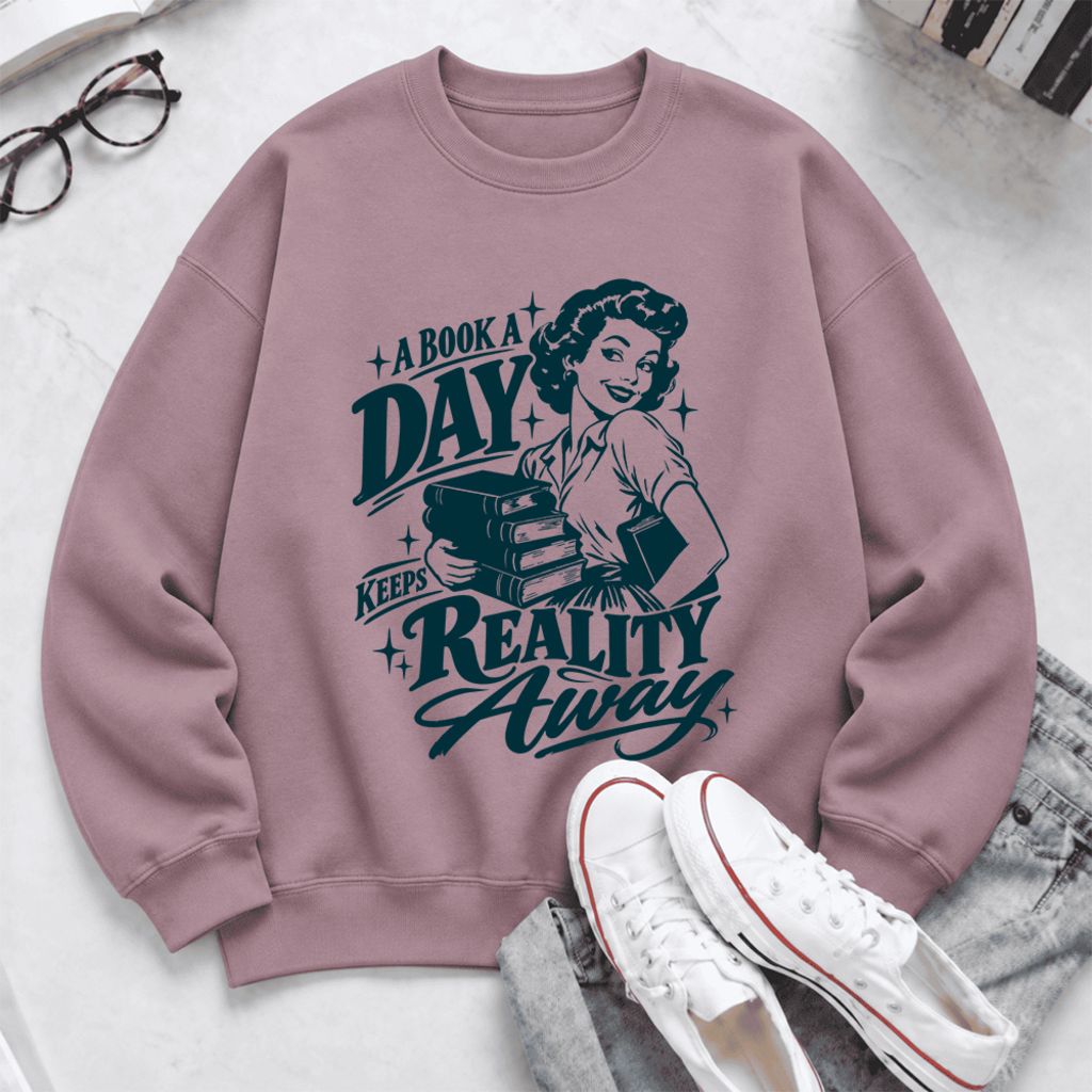 A Book A Day Keeps Reality Away Softstyle Sweatshirt | Cozy Book Lover Gift Paragon