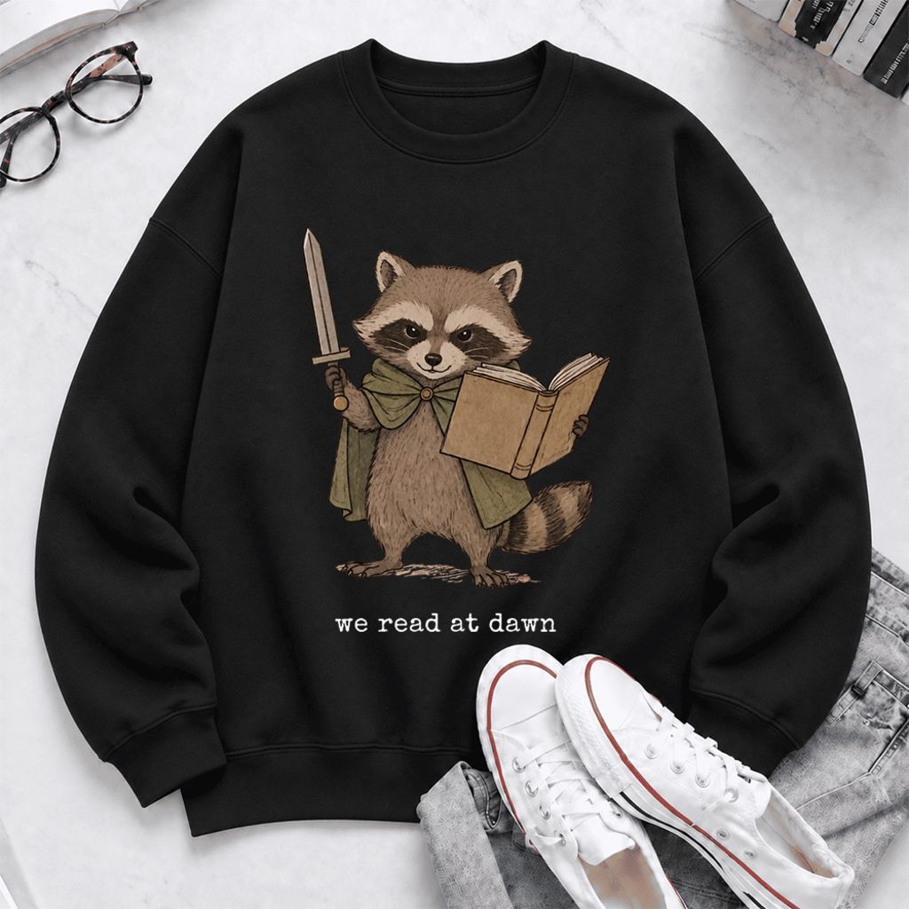 We Read At Dawn Funny Racoon Softstyle Sweatshirt | Cozy Book Lover Gift Black