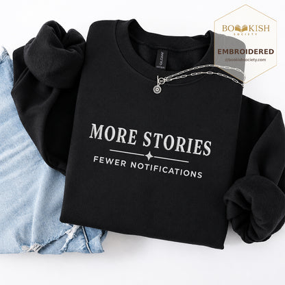 More Stories, Fewer Notifications Embroidered Sweatshirt | Reader Gift Black