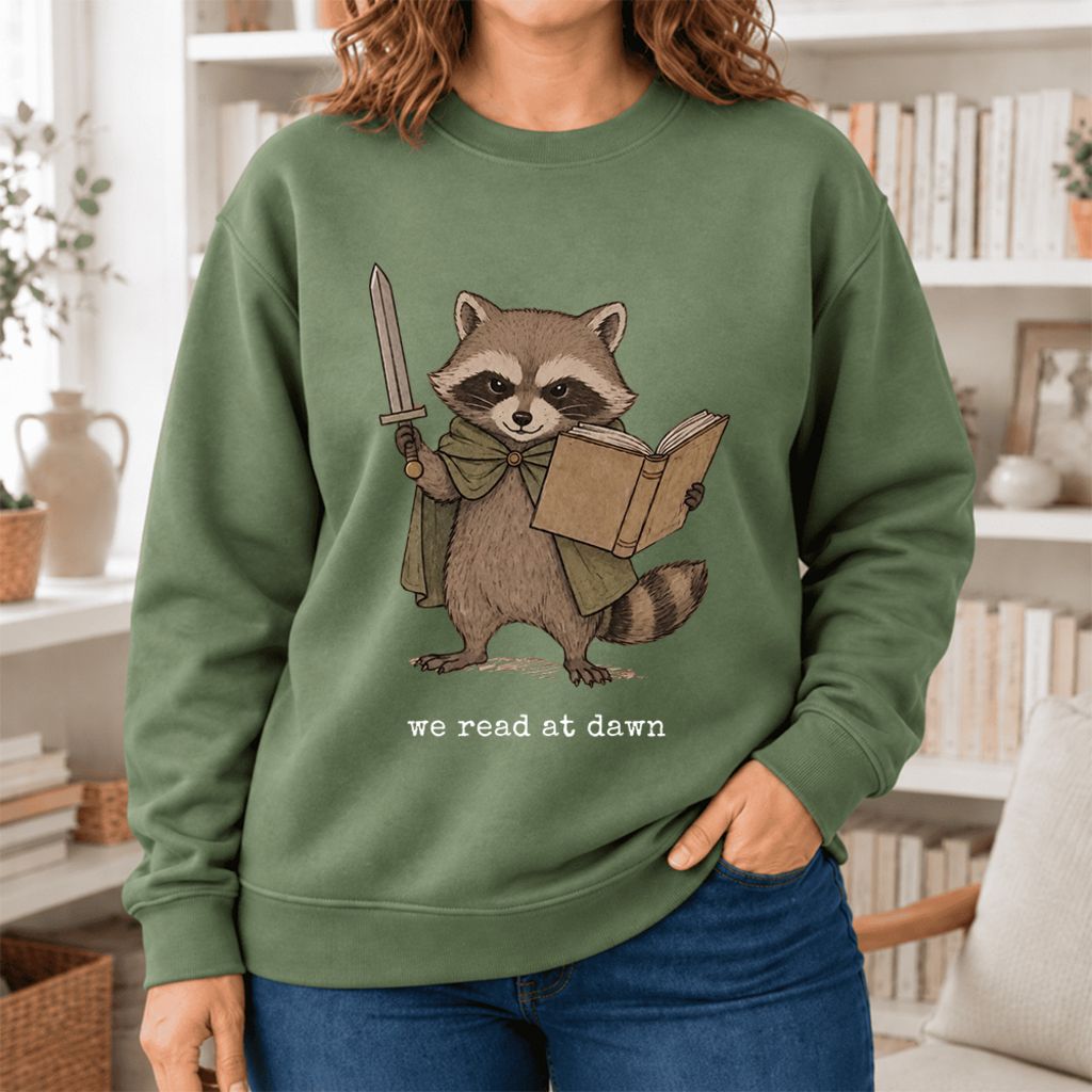 We Read At Dawn Funny Racoon Softstyle Sweatshirt | Cozy Book Lover Gift Military Green