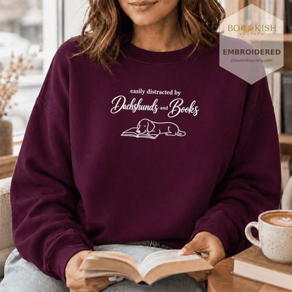 Easily Distracted By Dachshunds And Books Embroidered Sweatshirt | Reader Gift Maroon