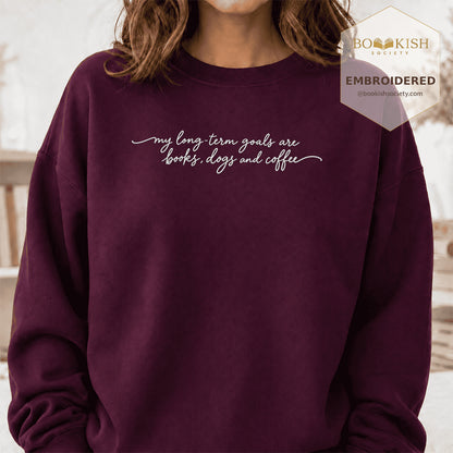 My Long-Term Goals Are Books Dogs And Coffee Embroidered Sweatshirt | Coffee, Dog Lover & Reader Gift Maroon
