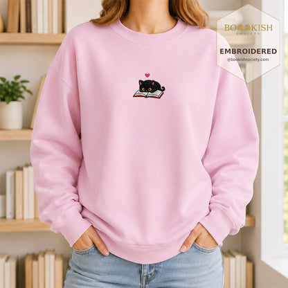 Black Cat and Book Embroidered Sweatshirt | Reader Gift Light Pink