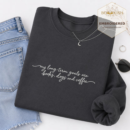 My Long-Term Goals Are Books Dogs And Coffee Embroidered Sweatshirt | Coffee, Dog Lover & Reader Gift Dark Heather