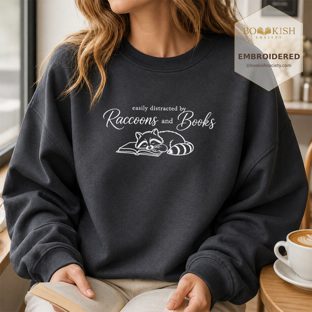 Easily Distracted By Raccoons And Books Embroidered Sweatshirt | Reader Gift Dark Heather