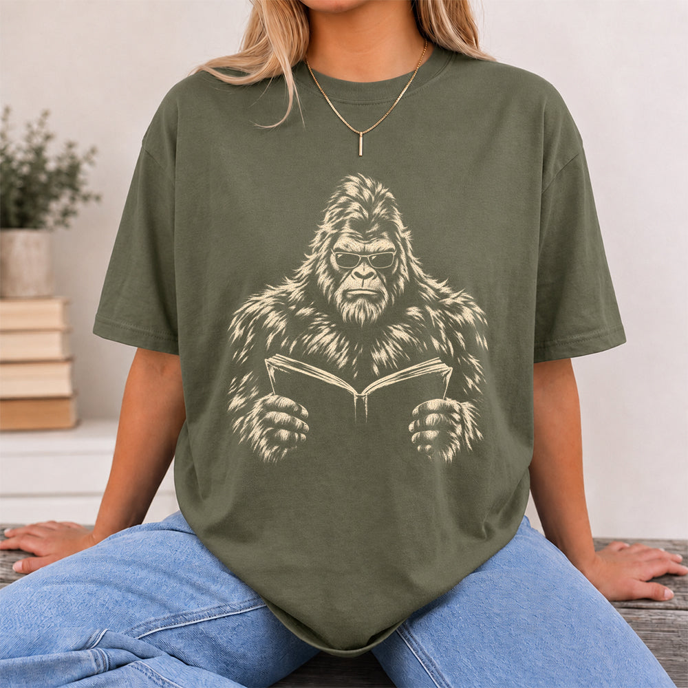 Big Foot Reading Book Softstyle T-Shirt | Book Lover Gift Military Green