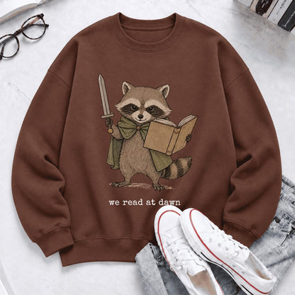 We Read At Dawn Funny Racoon Softstyle Sweatshirt | Cozy Book Lover Gift Cocoa