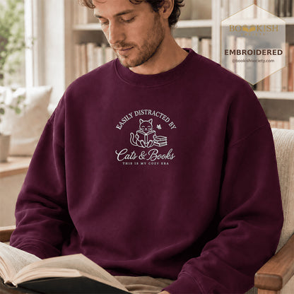 Easily Distracted By Cats And Books V2 Embroidered Sweatshirt | Reader Gift Maroon