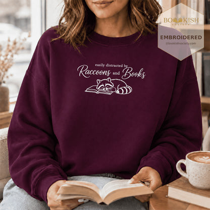 Easily Distracted By Raccoons And Books Embroidered Sweatshirt | Reader Gift Maroon