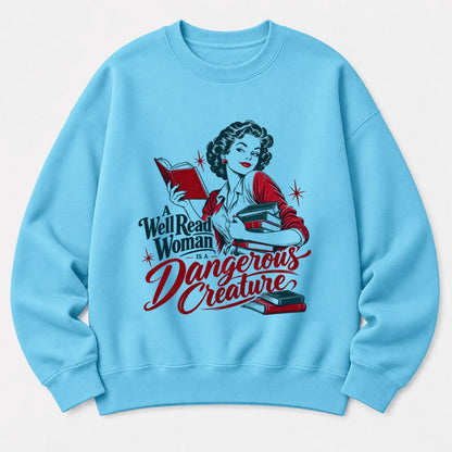 A Well Read Woman Is A Dangerous Creature Softstyle Sweatshirt | Reader Gift Sky