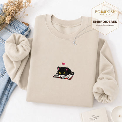 Black Cat and Book Embroidered Sweatshirt | Reader Gift Sand