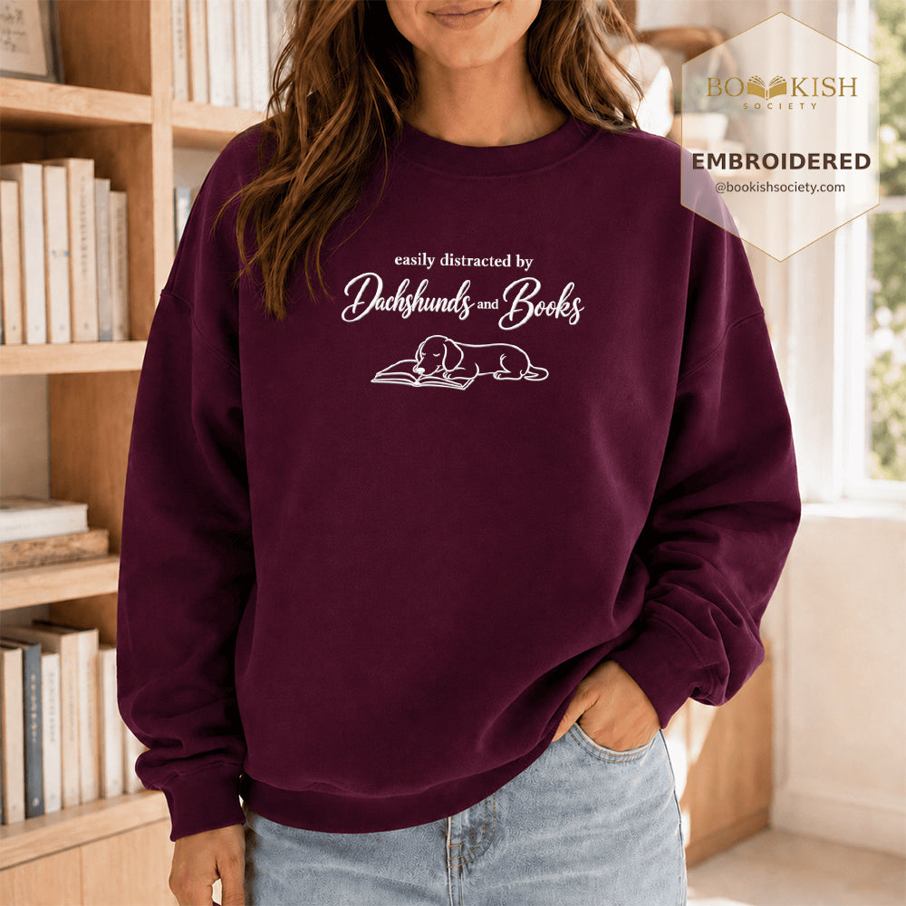 Easily Distracted By Dachshunds And Books Embroidered Sweatshirt | Reader Gift Maroon