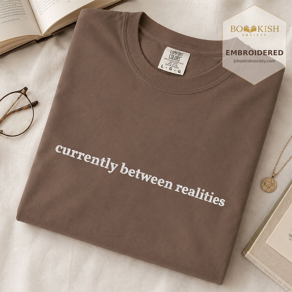 Embroidered Currently Between Realities Comfort Color® T-shirt Book Lover Gift Espresso