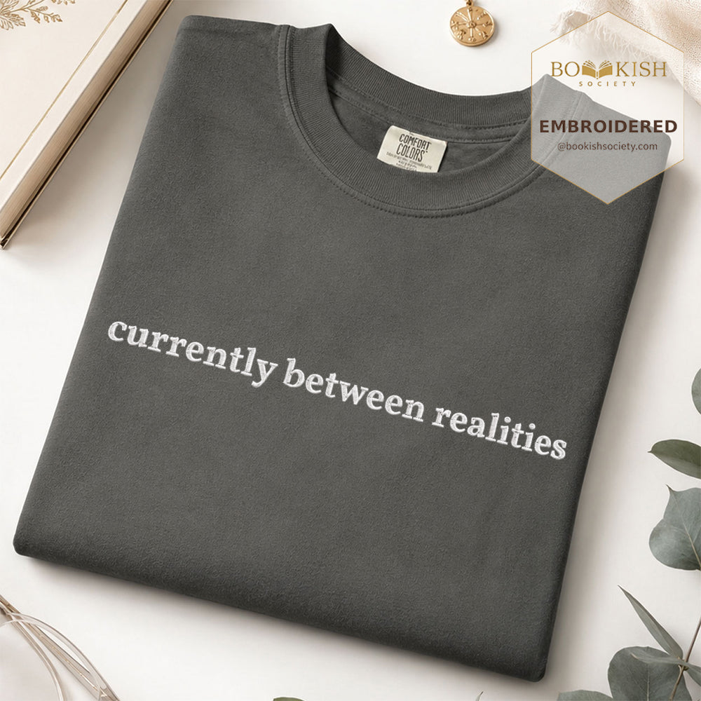Embroidered Currently Between Realities Comfort Color® T-shirt Book Lover Gift Pepper