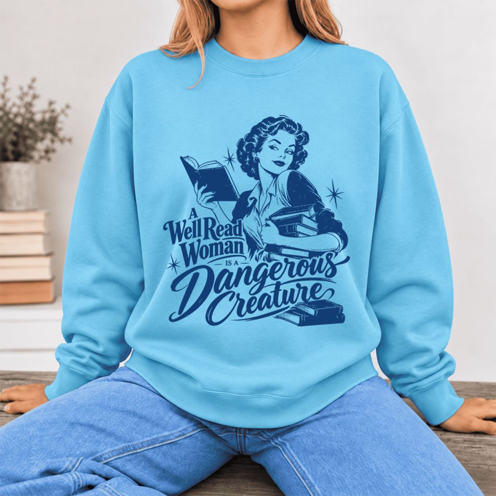 A Well Read Woman Is A Dangerous Creature Softstyle Sweatshirt | Feminist Gift Sky