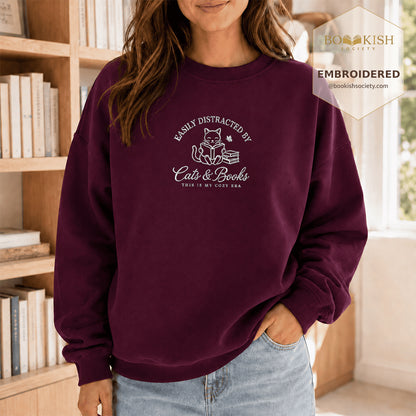 Easily Distracted By Cats And Books V2 Embroidered Sweatshirt | Reader Gift Maroon