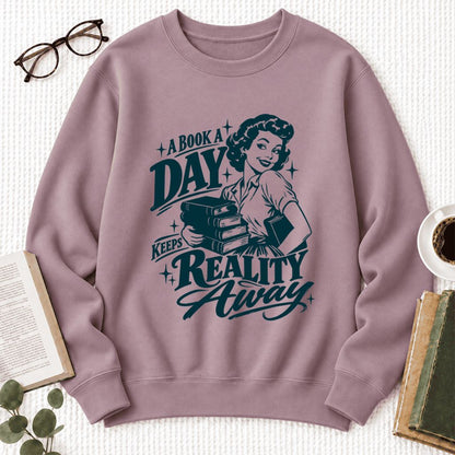 A Book A Day Keeps Reality Away Softstyle Sweatshirt | Cozy Book Lover Gift Paragon