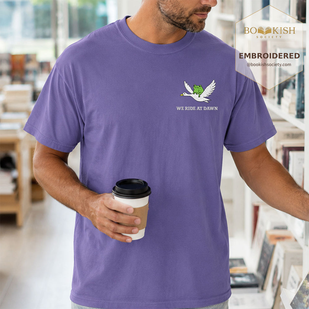 Embroidered We Ride at Dawn Comfort Color ® T-shirt Book Lover Gift Grape