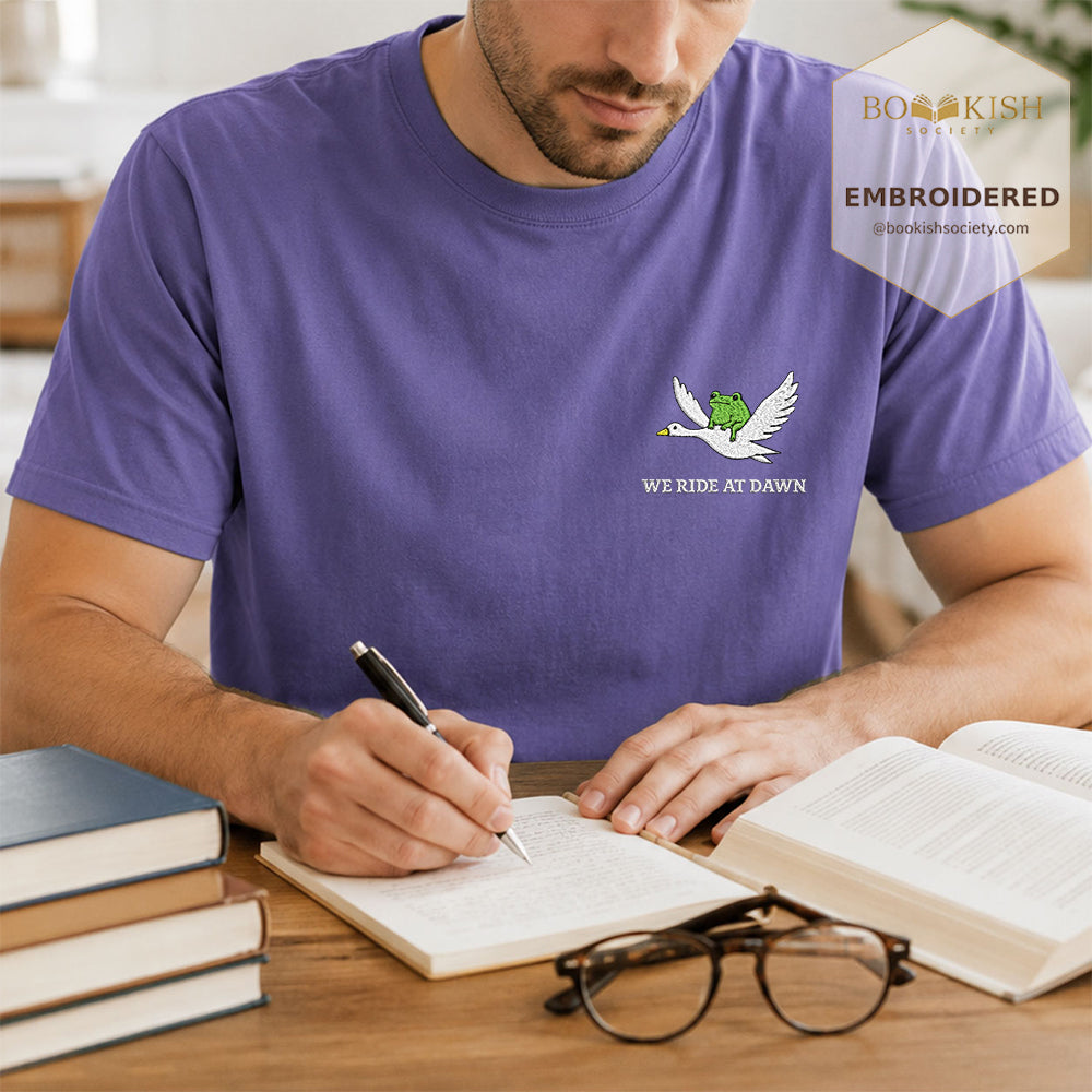 Embroidered We Ride at Dawn Comfort Color ® T-shirt Book Lover Gift Grape