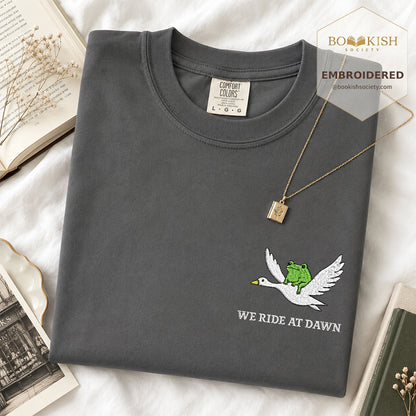 Embroidered We Ride at Dawn Comfort Color ® T-shirt Book Lover Gift Graphite