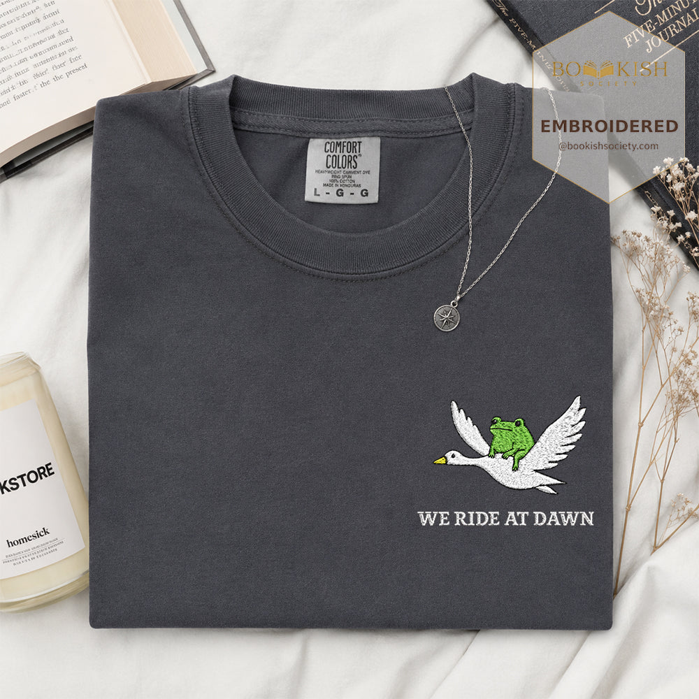 Embroidered We Ride at Dawn Comfort Color ® T-shirt Book Lover Gift Graphite