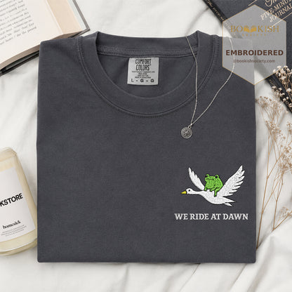 Embroidered We Ride at Dawn Comfort Color ® T-shirt Book Lover Gift Graphite