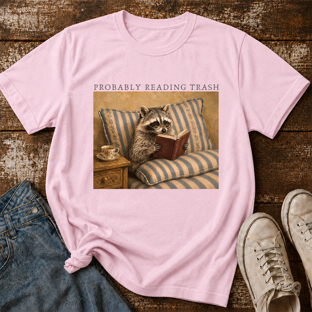 Probably Reading Trash Racoon Softstyle T-Shirt | Book Lover Gift Light Pink