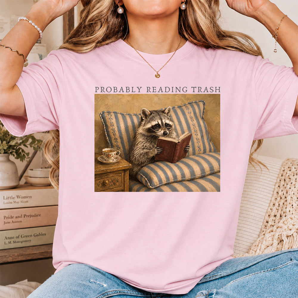 Probably Reading Trash Racoon Softstyle T-Shirt | Book Lover Gift Light Pink