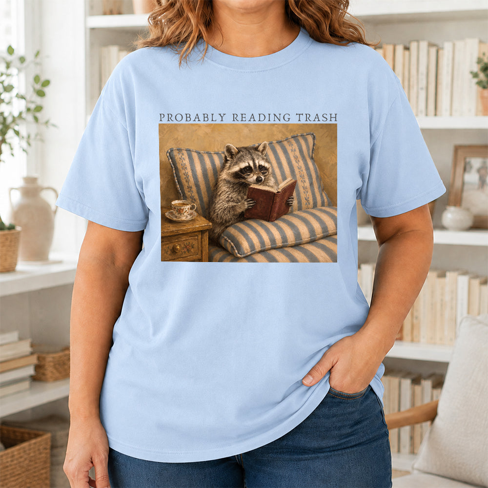 Probably Reading Trash Racoon Softstyle T-Shirt | Book Lover Gift Light Blue