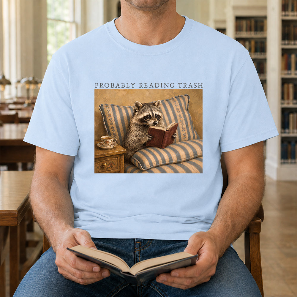 Probably Reading Trash Racoon Softstyle T-Shirt | Book Lover Gift Light Blue