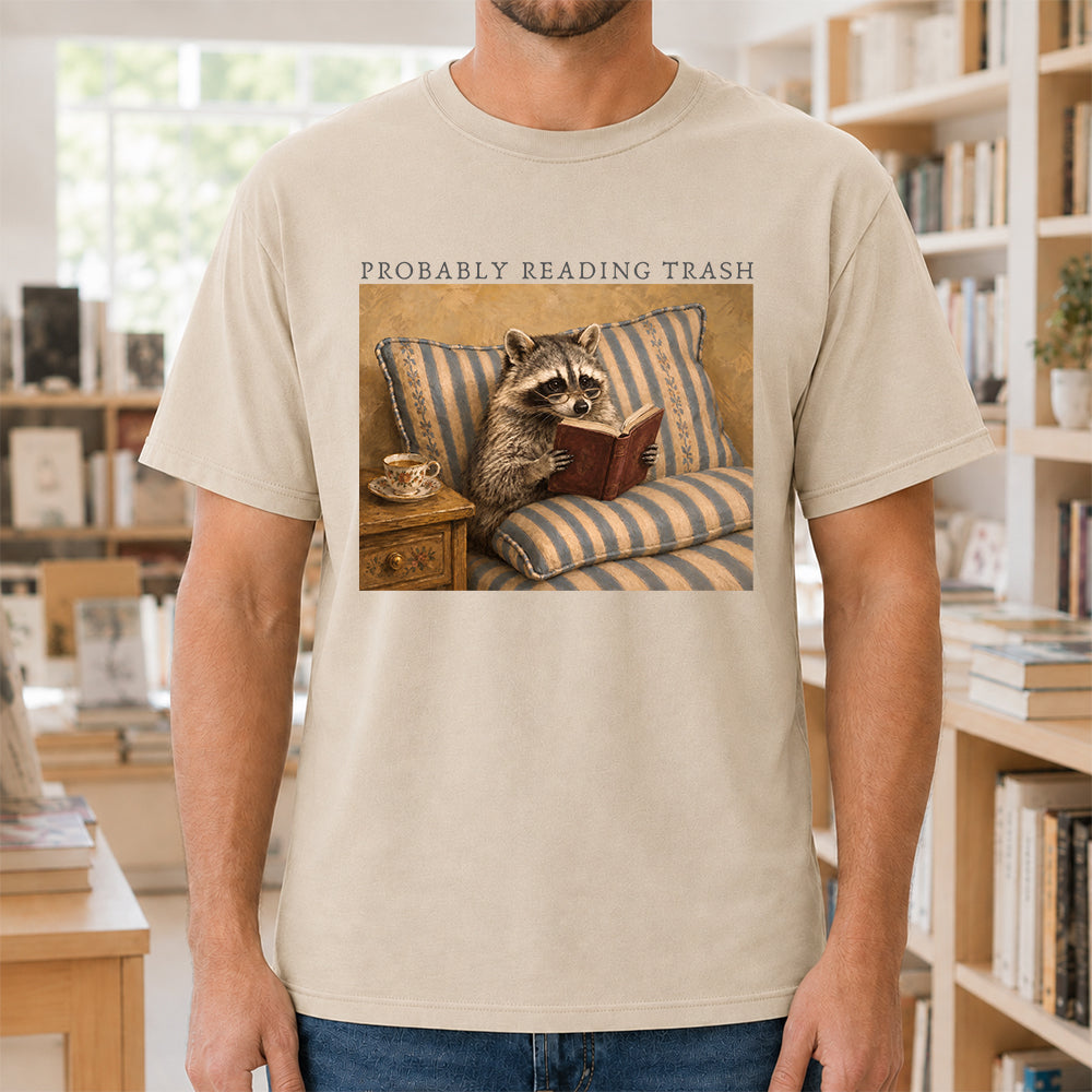 Probably Reading Trash Racoon Softstyle T-Shirt | Book Lover Gift Sand