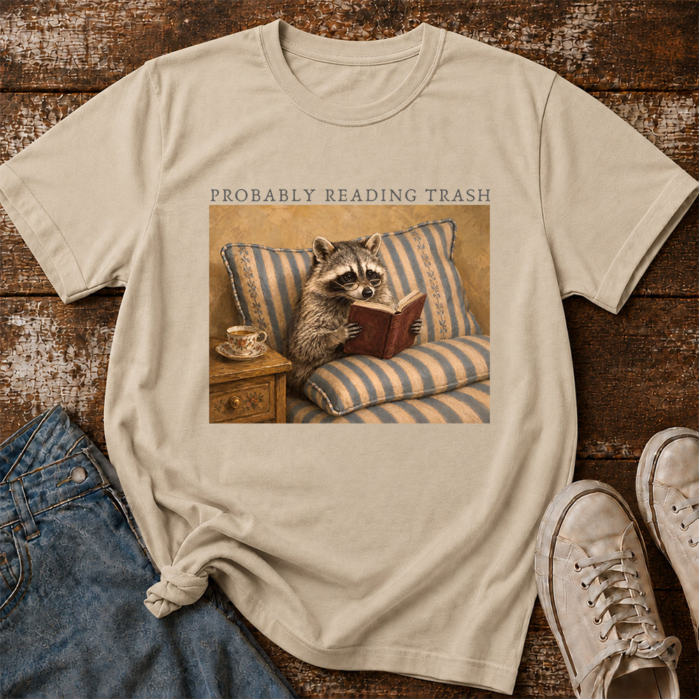 Probably Reading Trash Racoon Softstyle T-Shirt | Book Lover Gift Sand