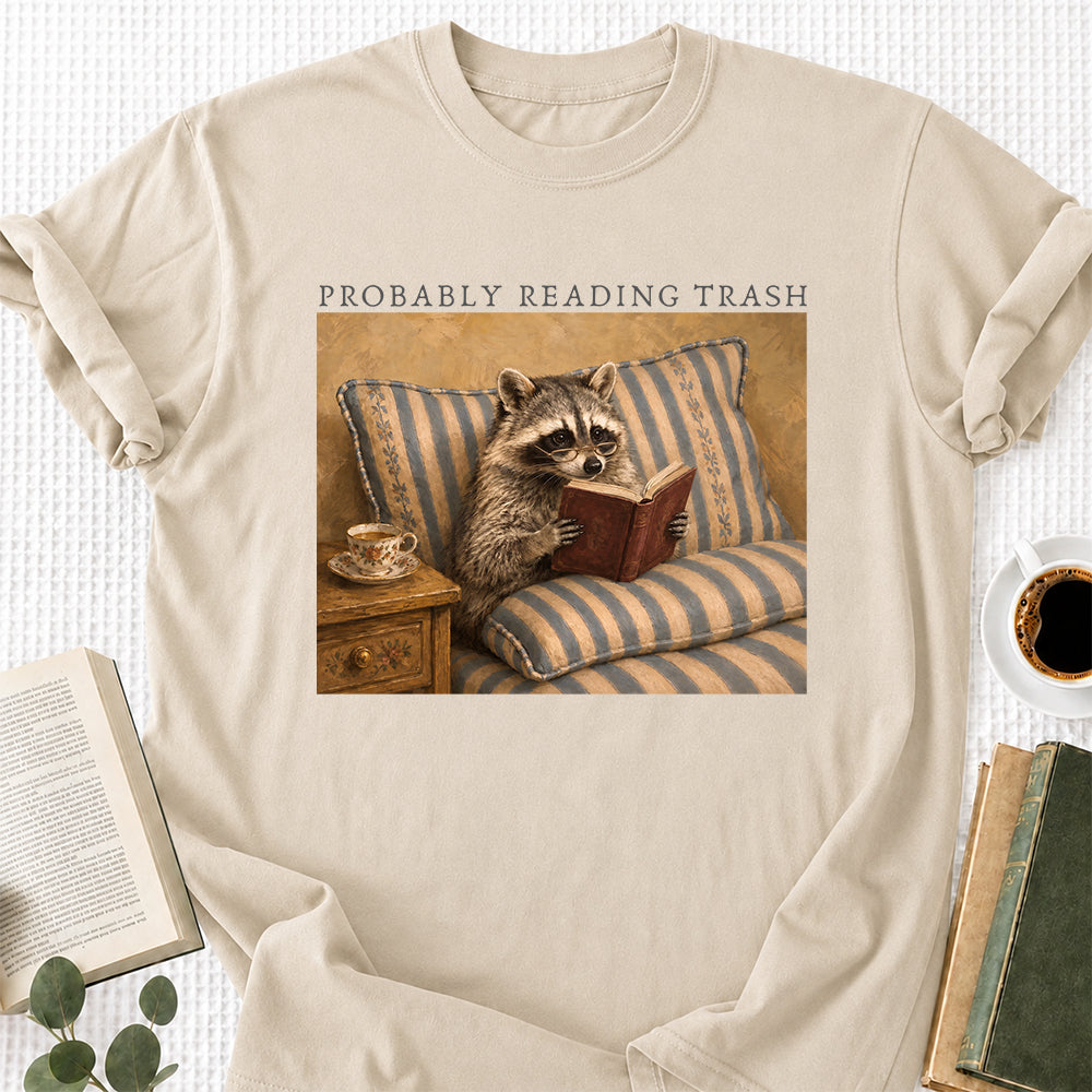 Probably Reading Trash Racoon Softstyle T-Shirt | Book Lover Gift Sand