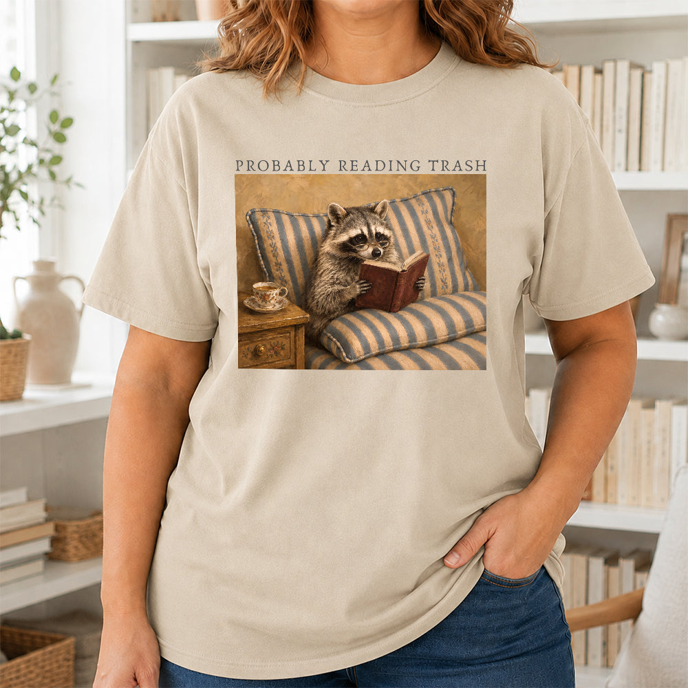 Probably Reading Trash Racoon Softstyle T-Shirt | Book Lover Gift Sand