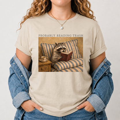 Probably Reading Trash Racoon Softstyle T-Shirt | Book Lover Gift Sand